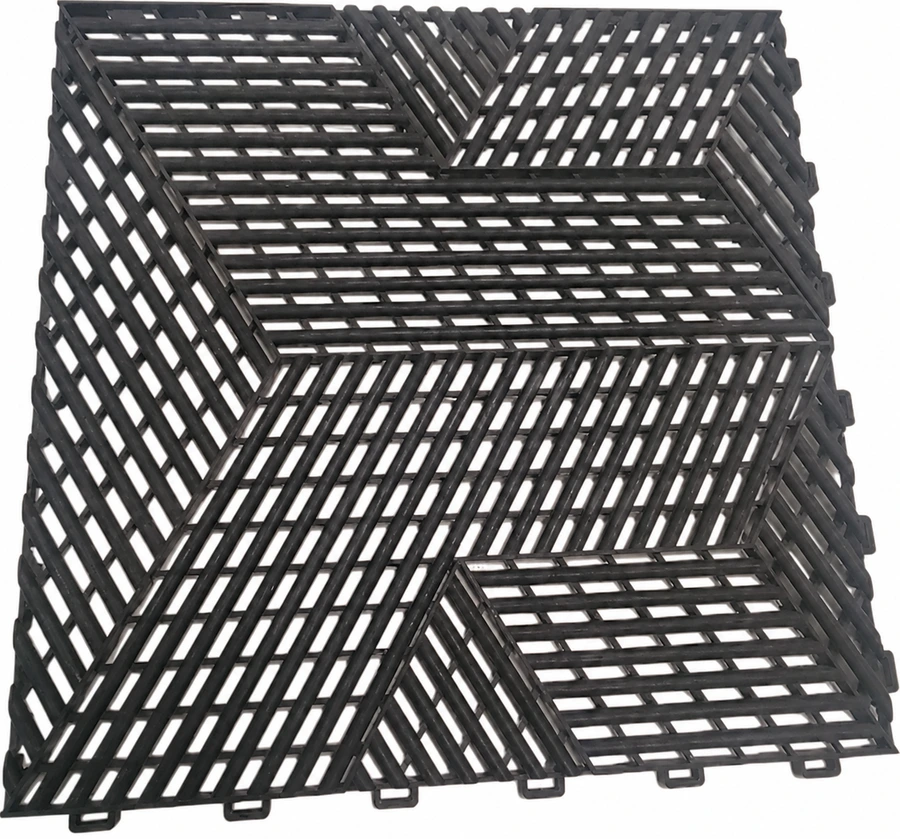 Charcoal modular tile sample showing its velocity · angular weave and edge connectors